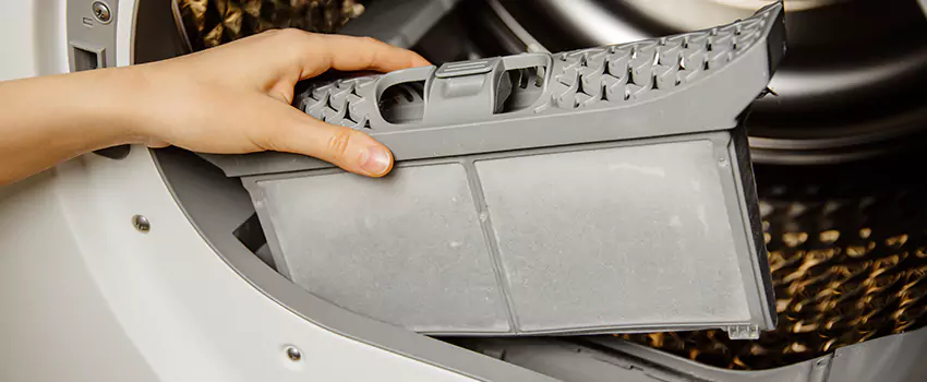 Signs Of A Clogged Dryer Lint Trap in Lincoln, Illinois